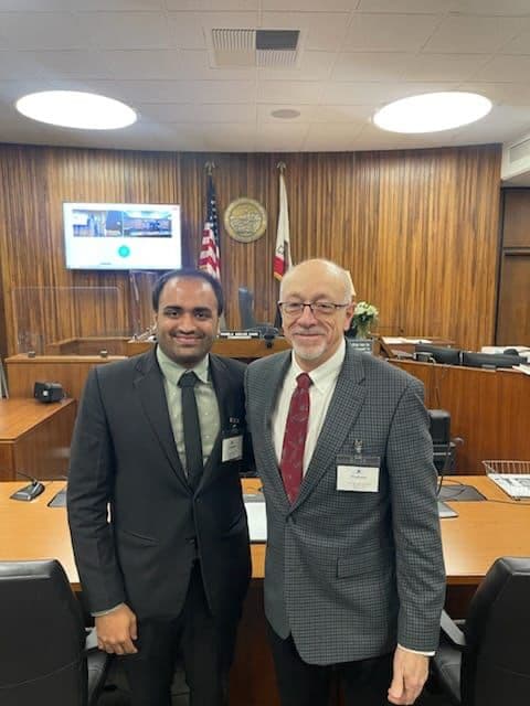 Karan Khetan with a colleague in a courtroom